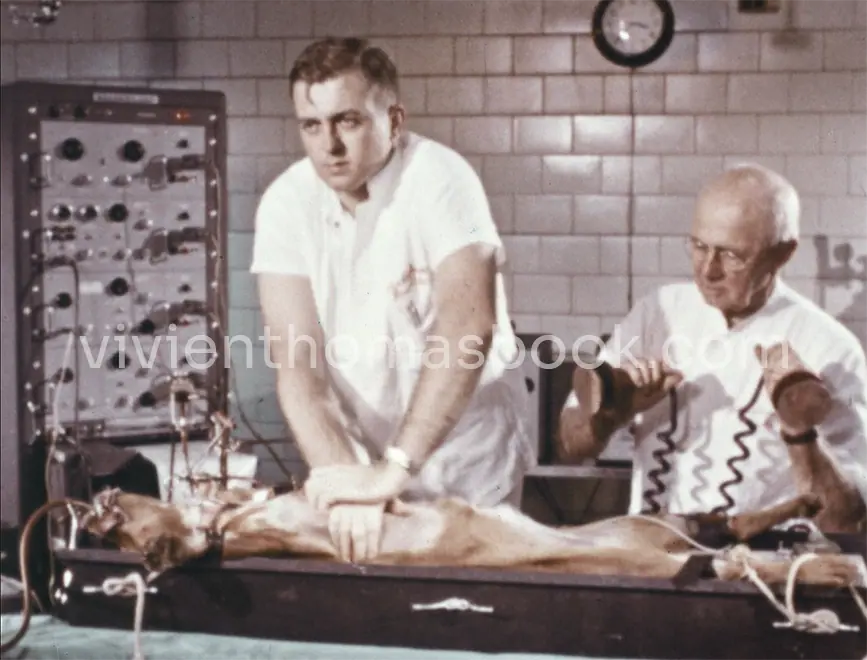 In 1950, Vivien Thomas assisted this research team (James Jude, MD and William Kouenhoven, PhD) as they tested closed heart massage (CPR) and an external heart defibrillator on a lab dog.