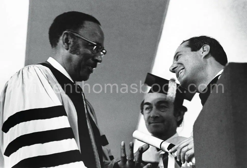 Vivien Thomas is shown proudly receiving his honorary Doctor of Laws degree from John Hopkins University at this ceremony in 1976.
