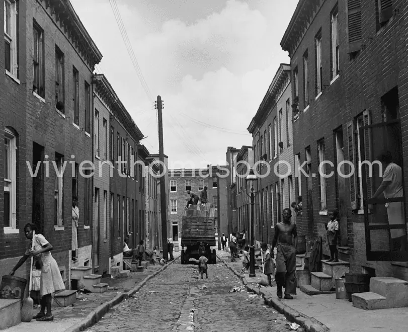 This is a typical segregated Black neighborhood in Baltimore where Vivien Thomas and his family, who had moved to Baltimore in 1941 from Nashville, had to pay an excessively high rent despite shabby offerings. The contrast between Black and white neighborhoods is dramatic: see the luxurious Baltimore house and neighborhood of Dr. Alfred Blalock and family.